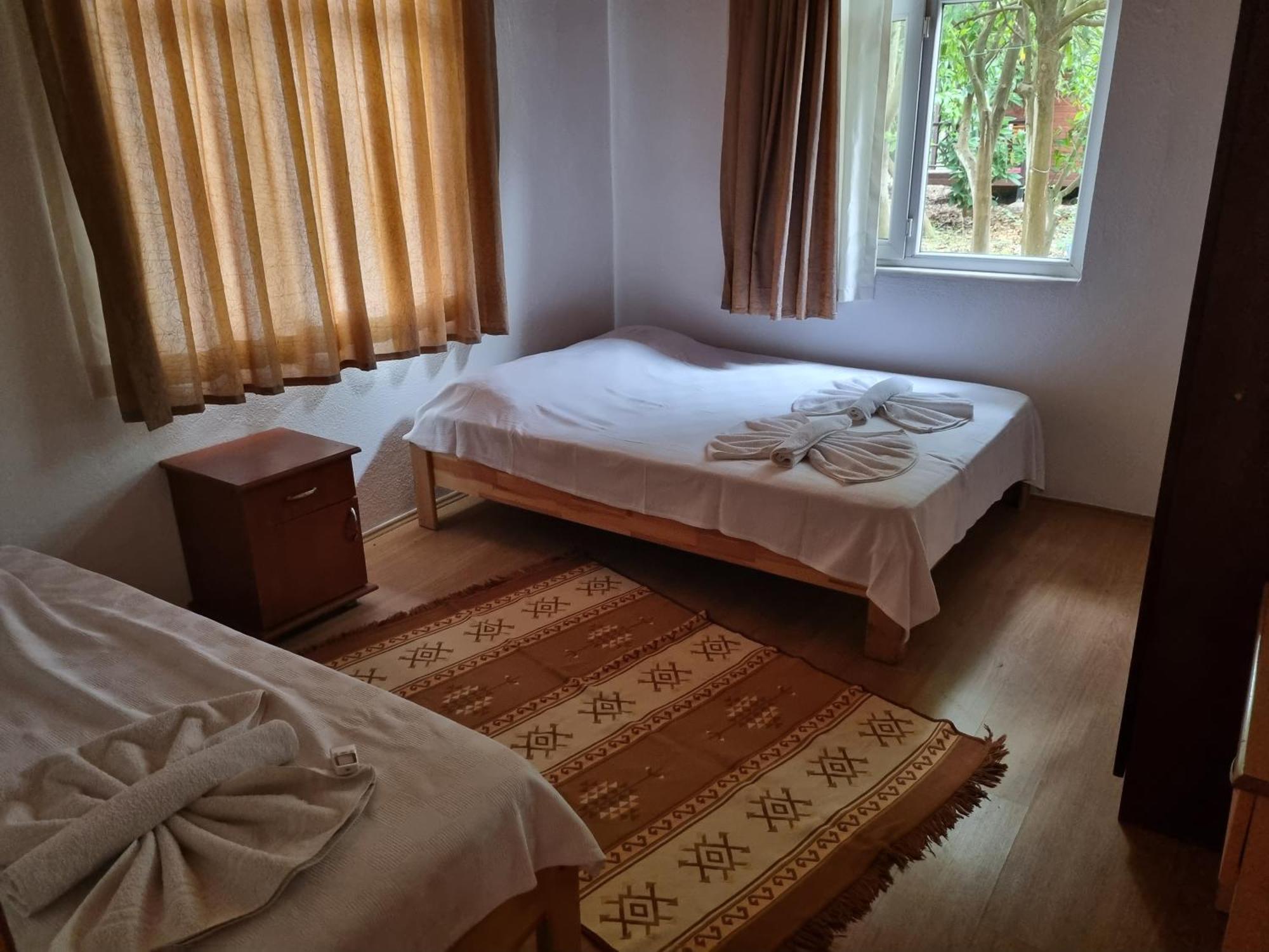 Ugur Pansiyon Bungalows Чирали Экстерьер фото